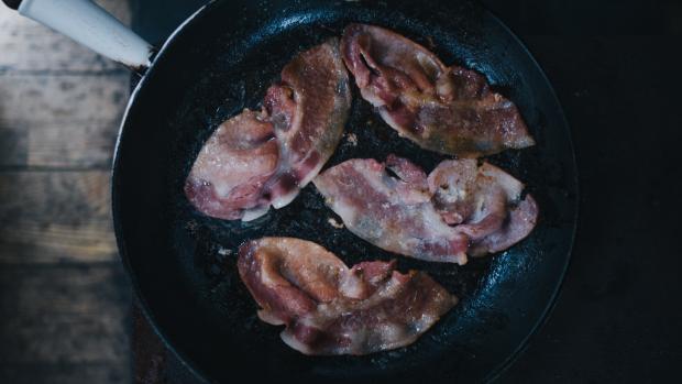 bacon in a frying pan