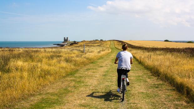 man cycling in nature